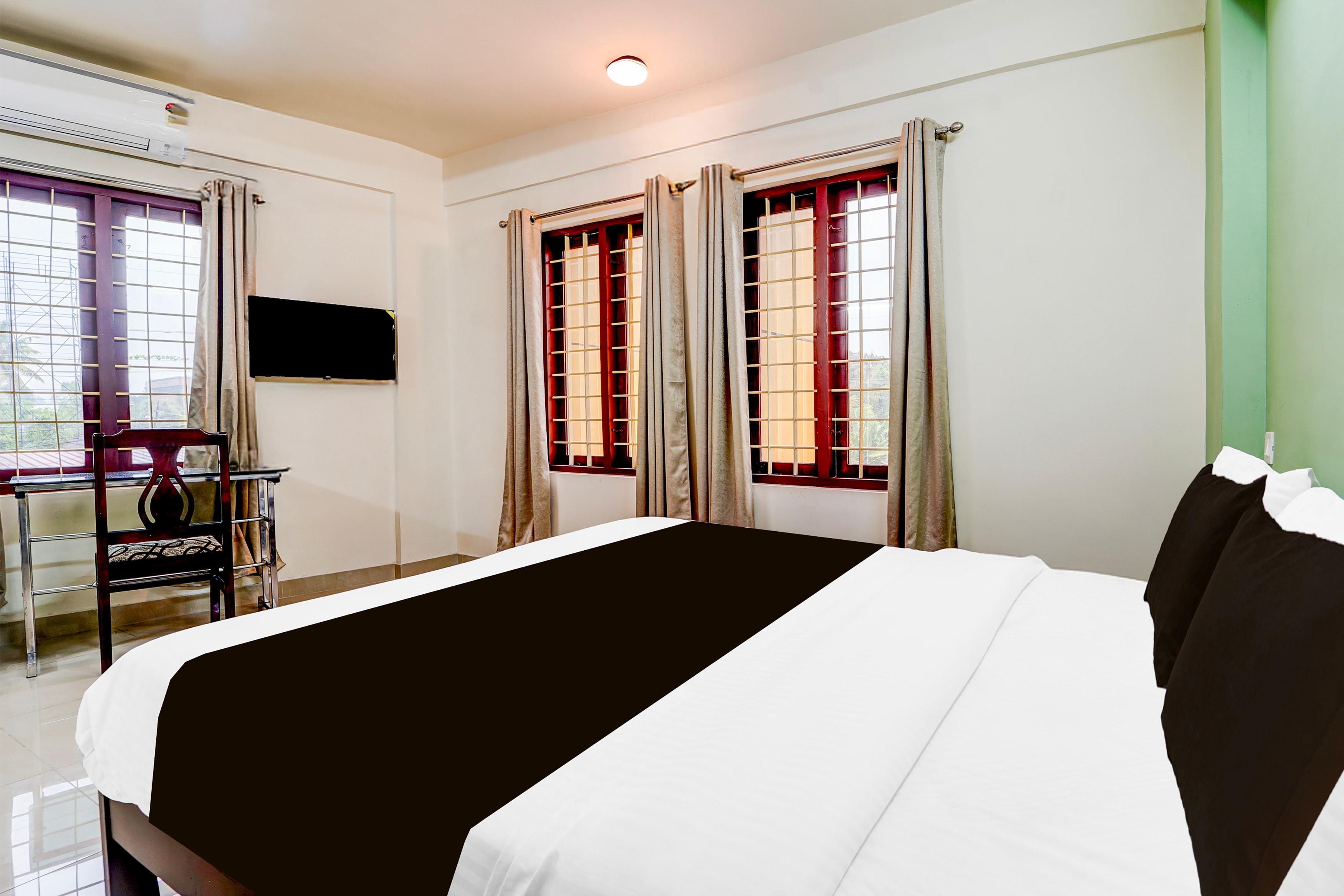 Collection O Kottayam Formerly Sap Inn - Tap to explore photos
