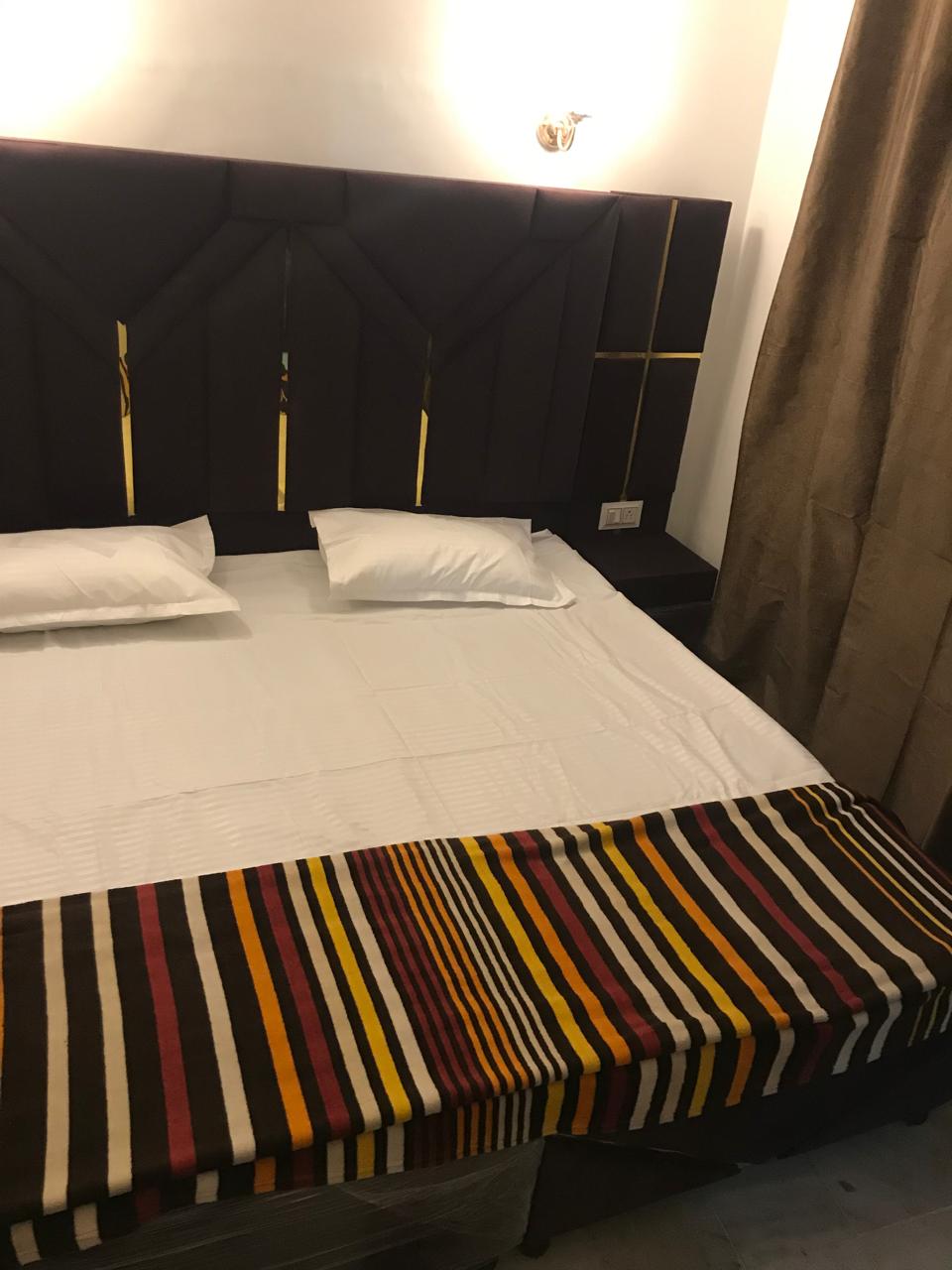 Hotel guruji residency - Tap to explore photos