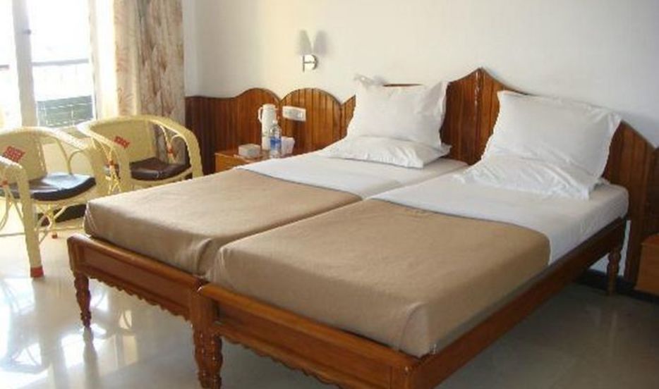 HOTEL SAMRAT LODGE - Tap to explore photos