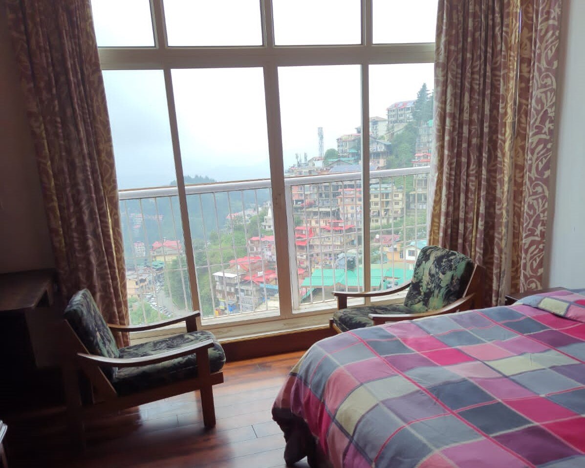 Travelnest Homestay | Mountain-view Rooms - Tap to explore photos