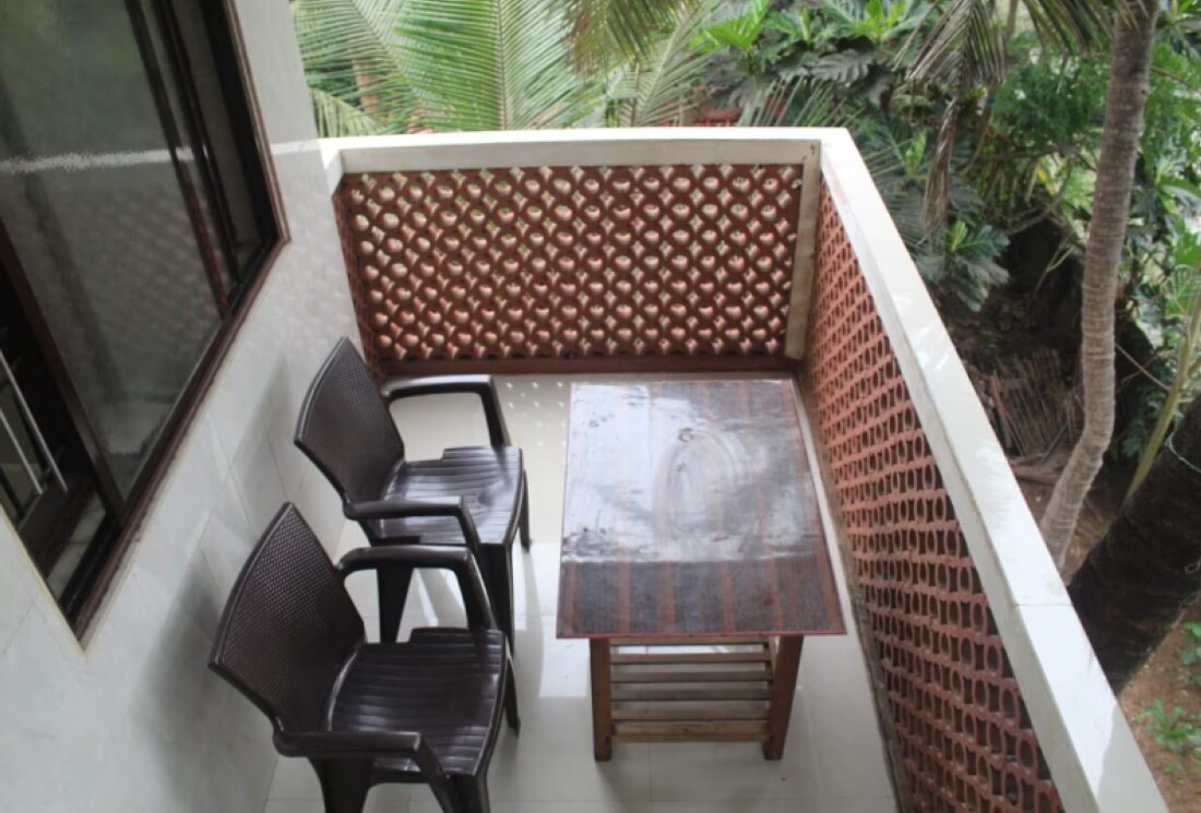 Surya Guest House, Gokarna - Tap to explore photos