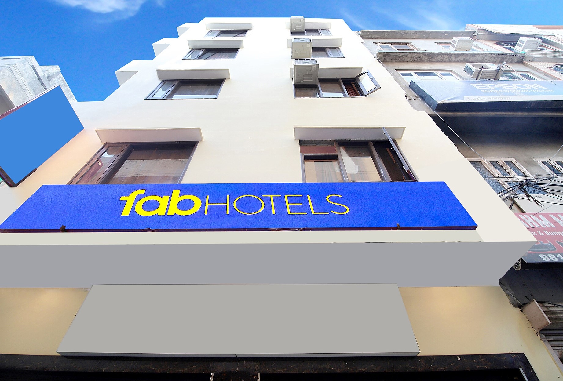 FabHotel Golden Sunrise Inn - Tap to explore photos