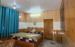 Deluxe room with common balcony and river view