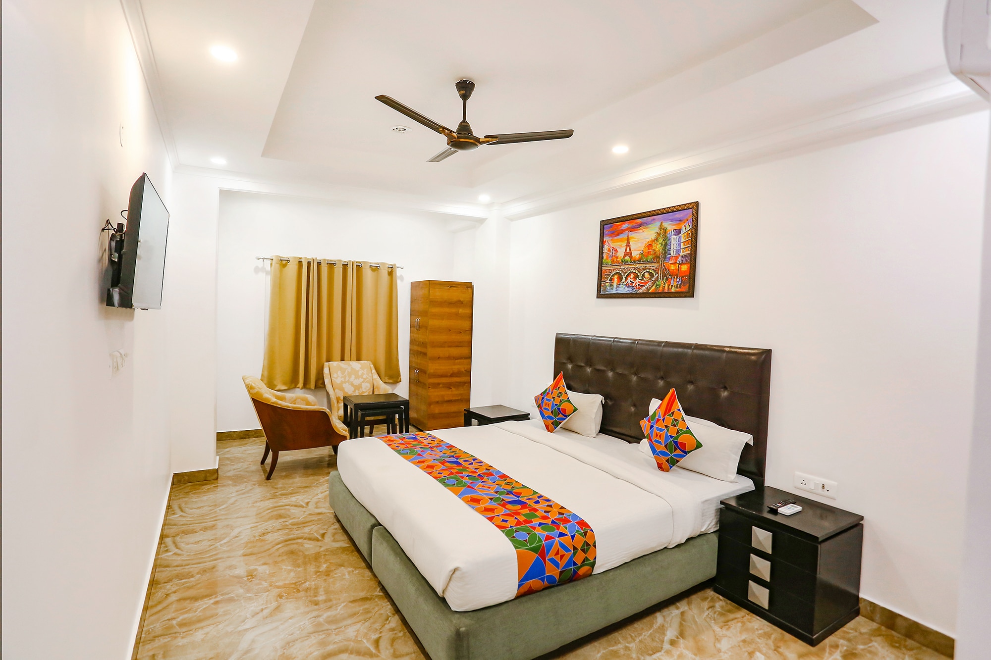 FabExpress Taj Residency - Nr. Yashobhoomi Convention Centre - Tap to explore photos