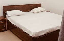 Airconditioned (AC) Deluxe rooms with king size bed with attached washroom