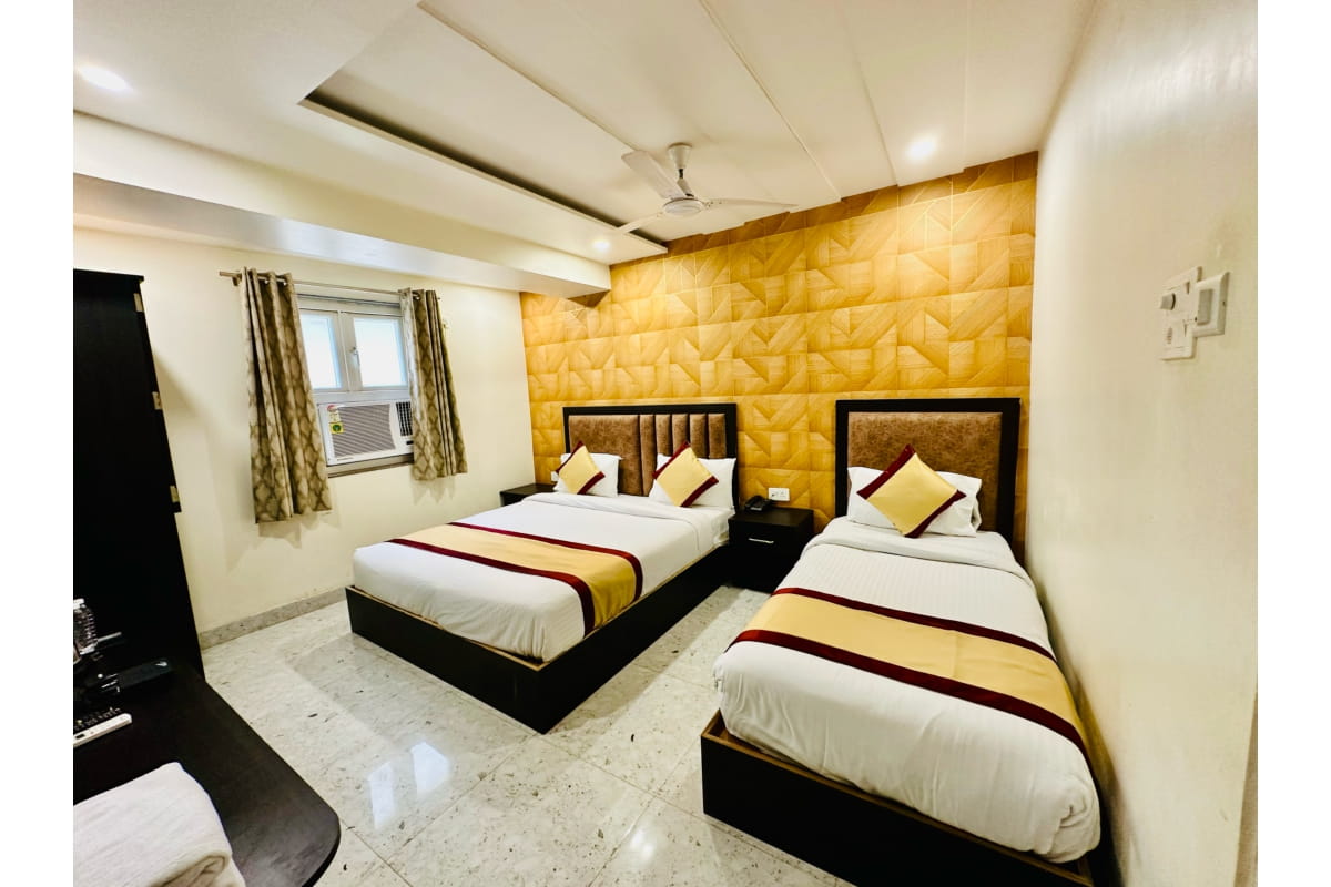 Hotel M K Grand Near Kashi Vishwanath Temple - Tap to explore photos