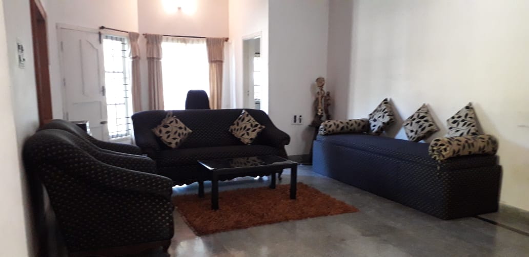 Rain Tree Homestay - Tap to explore photos