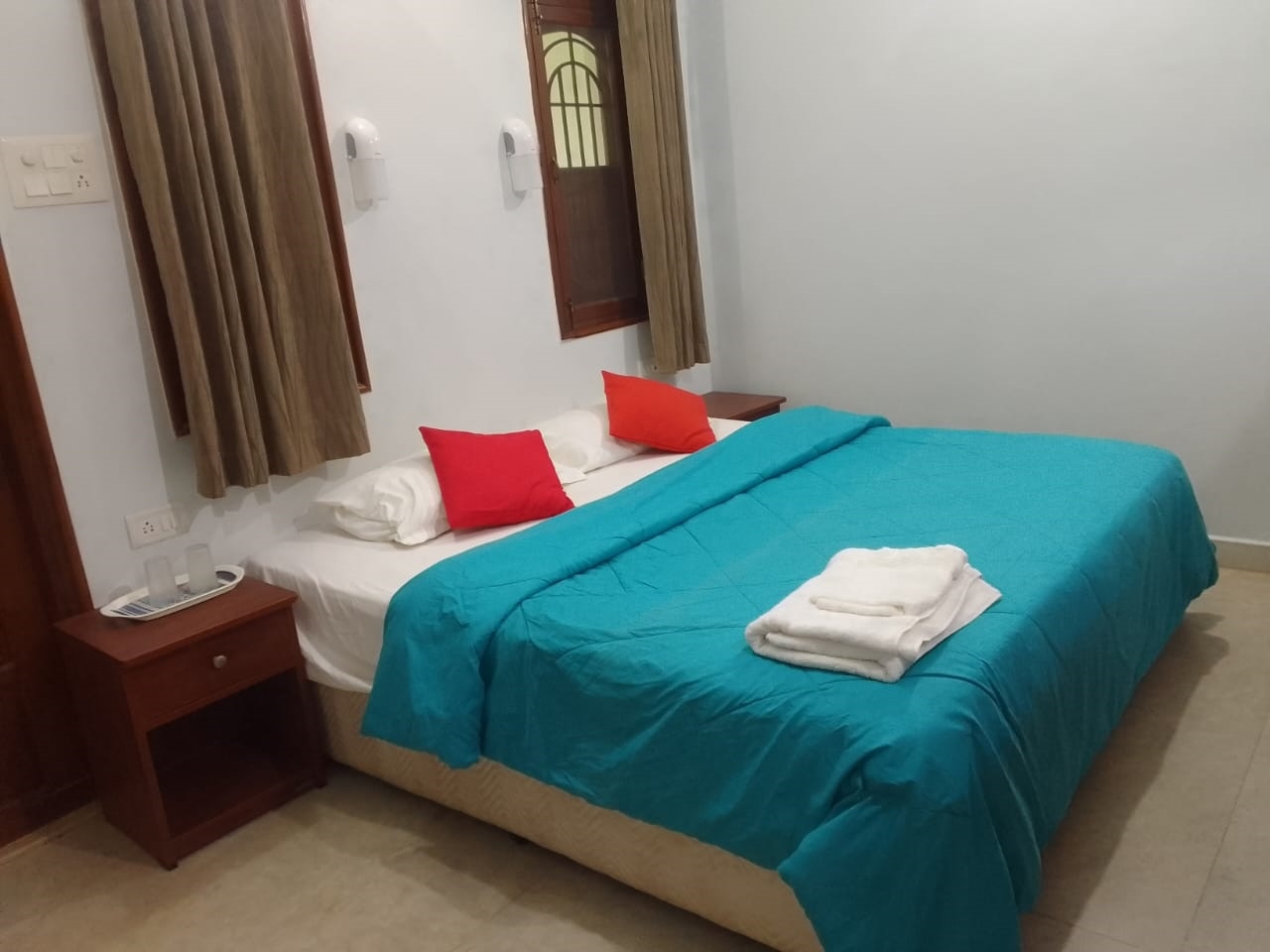 Peaceful rooms near Rajbag Beach - Tap to explore photos