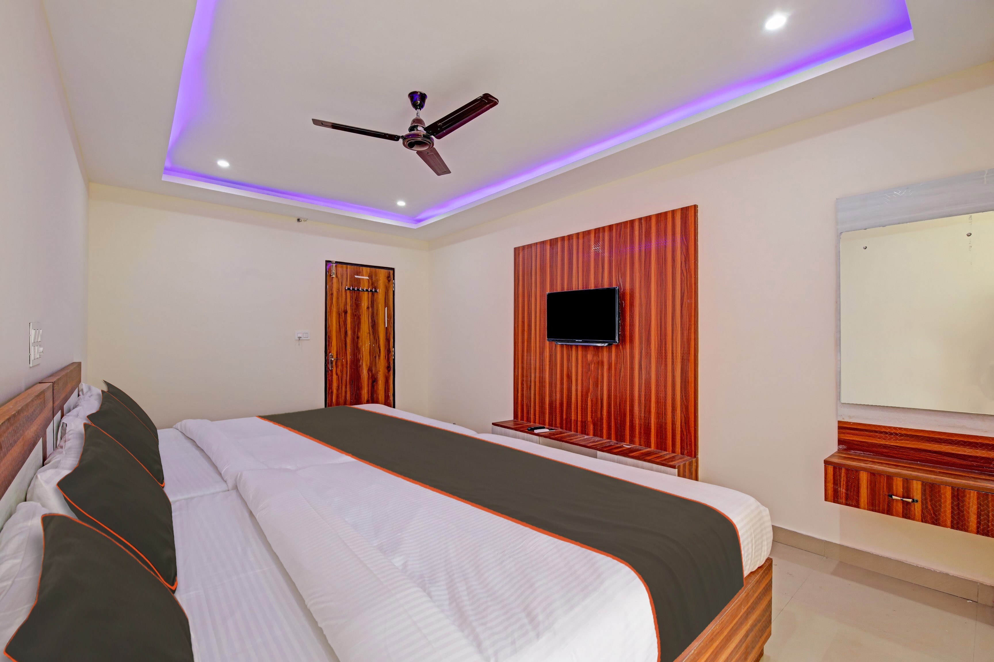 Collection O Daivik Sunset Suites - Tap to explore photos