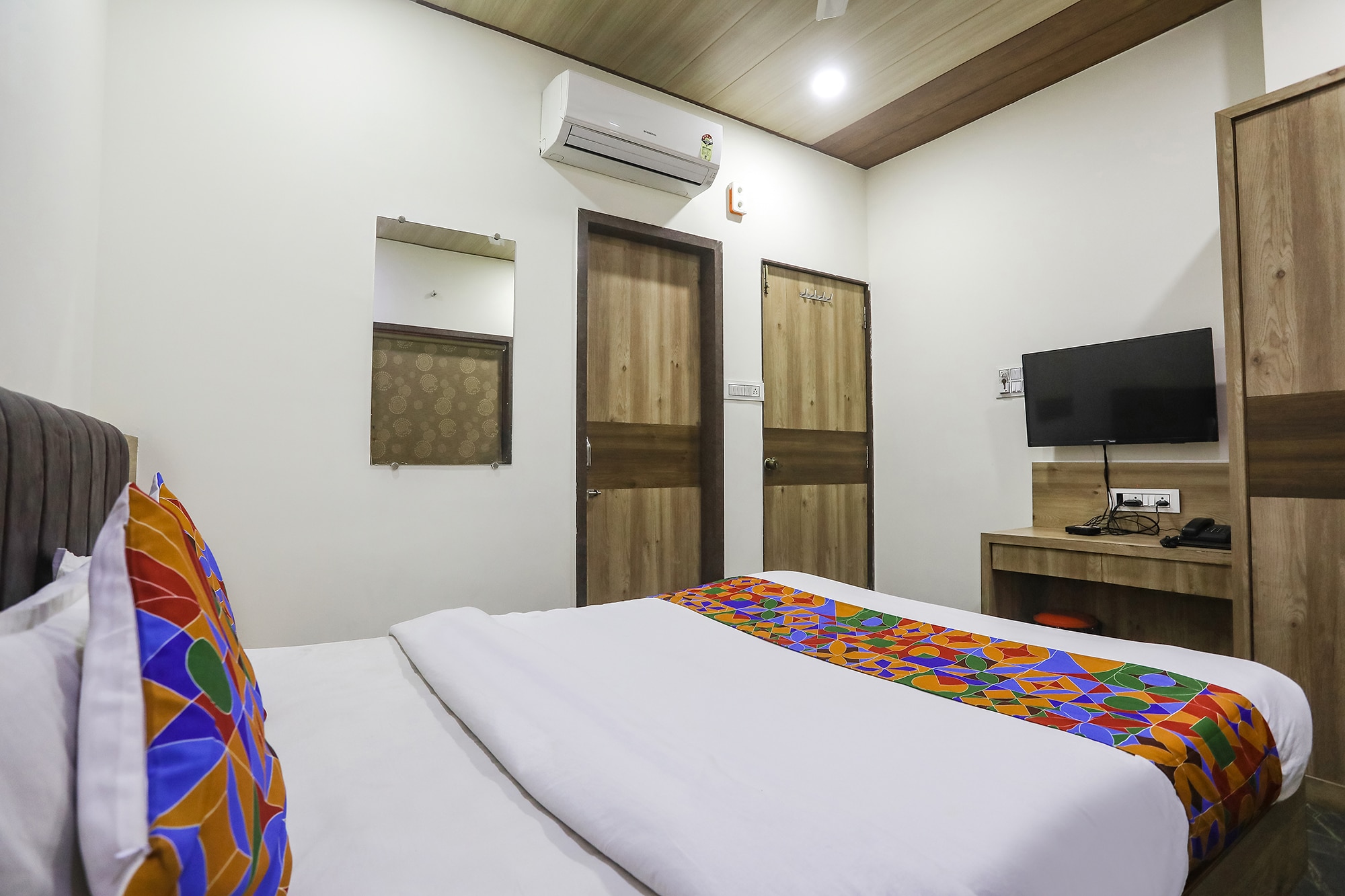 FabHotel Vedanta Inn - Nr. Sitabudli Fort - Tap to explore photos