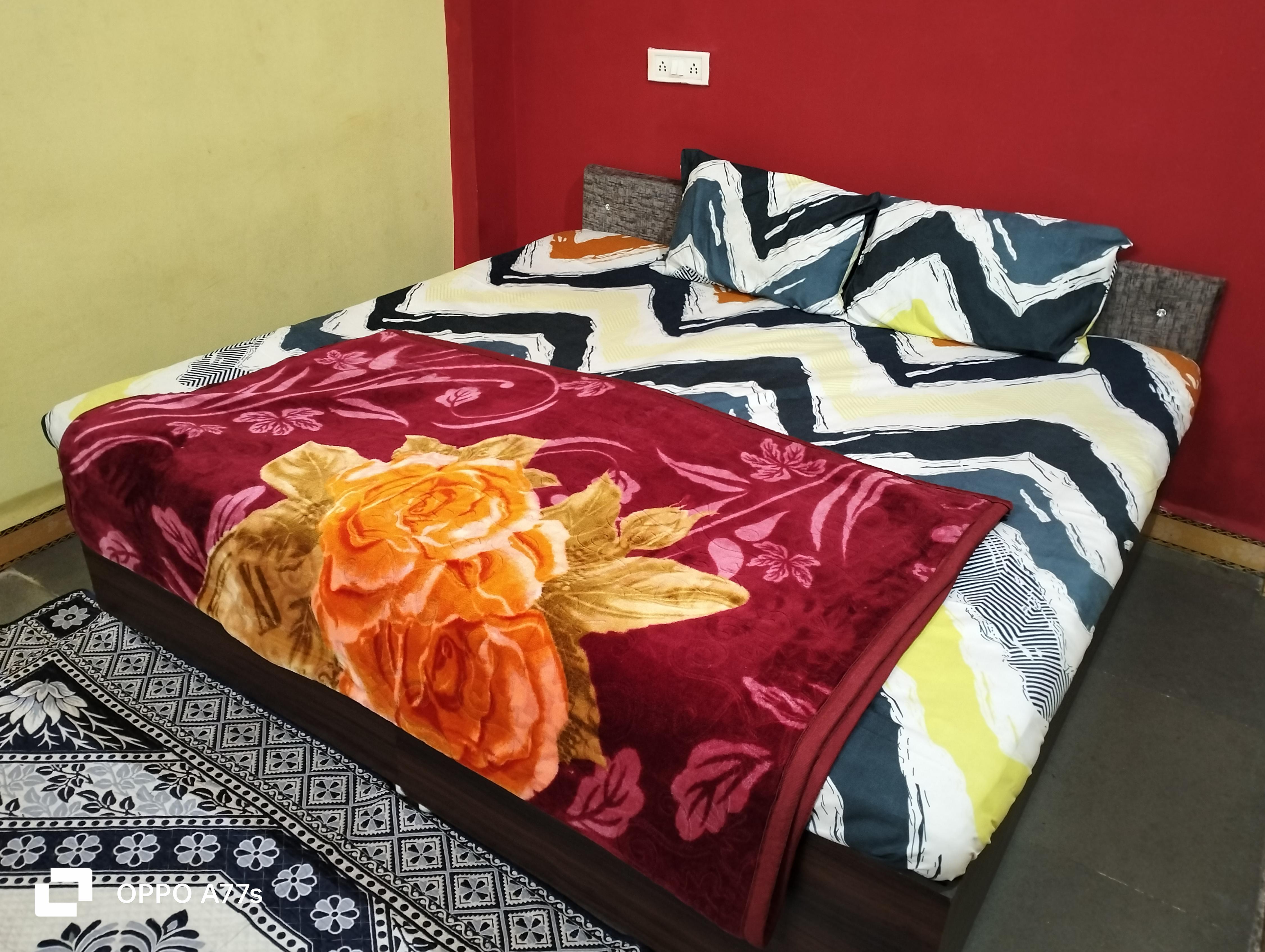 Shree Giriraj Home Stay - Tap to explore photos