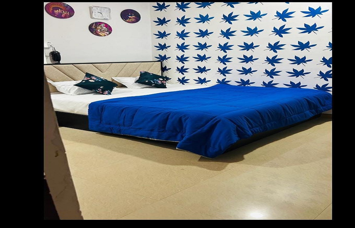 Pooja Hotel and Guest House - Tap to explore photos