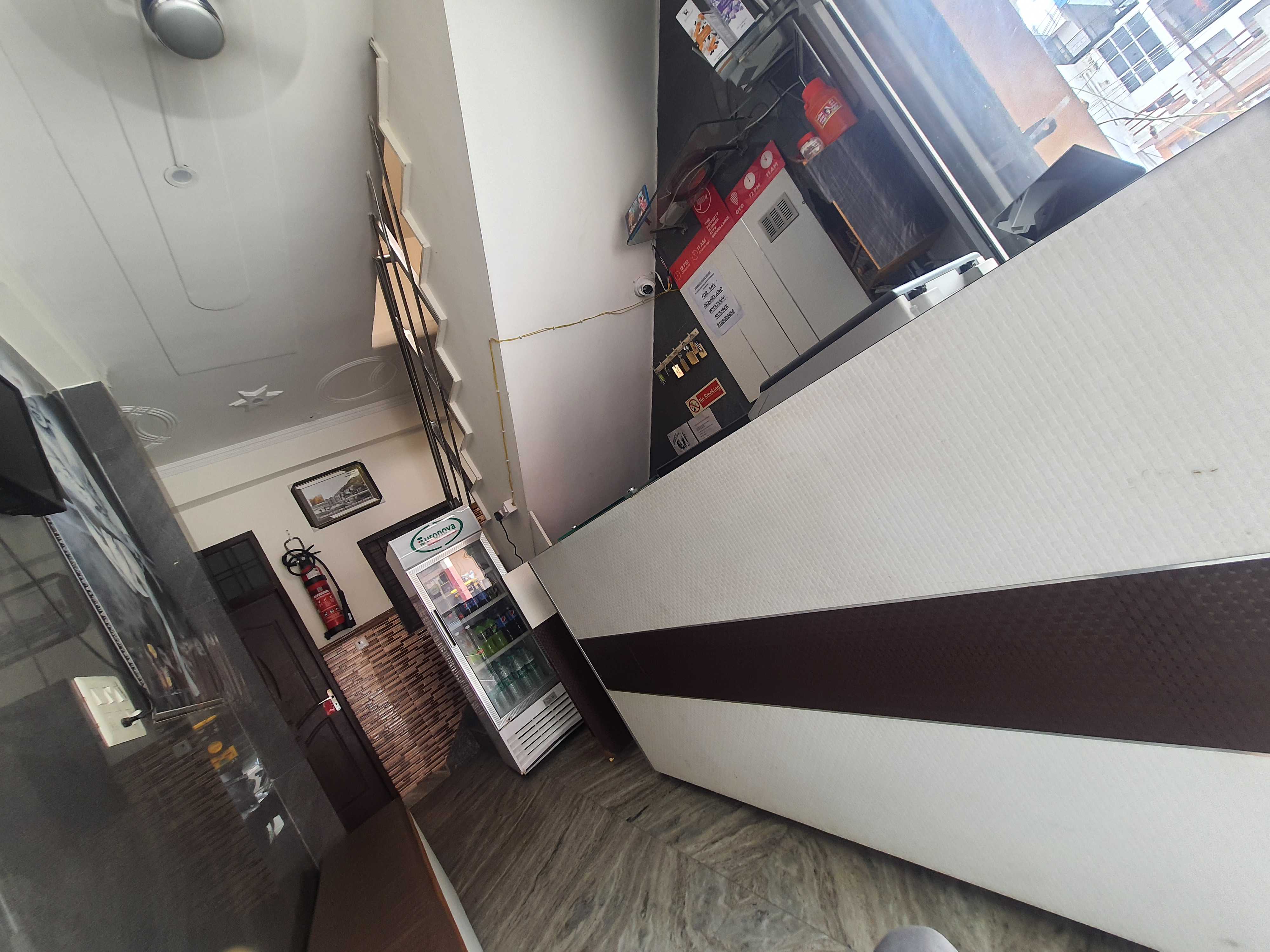 Hotel O Trimurti Guest House - Tap to explore photos