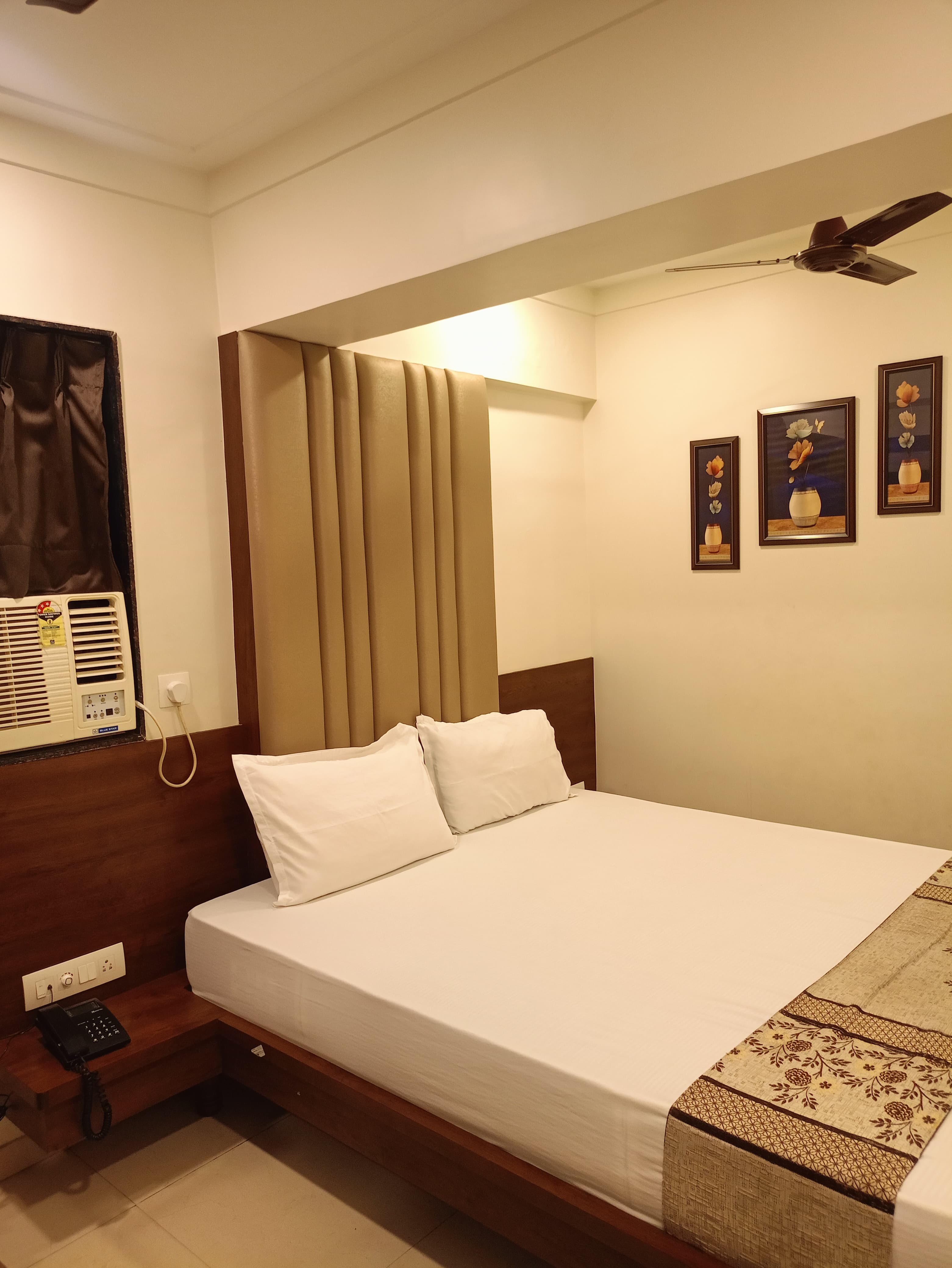 Hotel Diamora Residency - Tap to explore photos