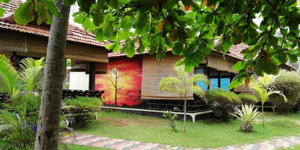 Maadathil Cottages - Tap to explore photos