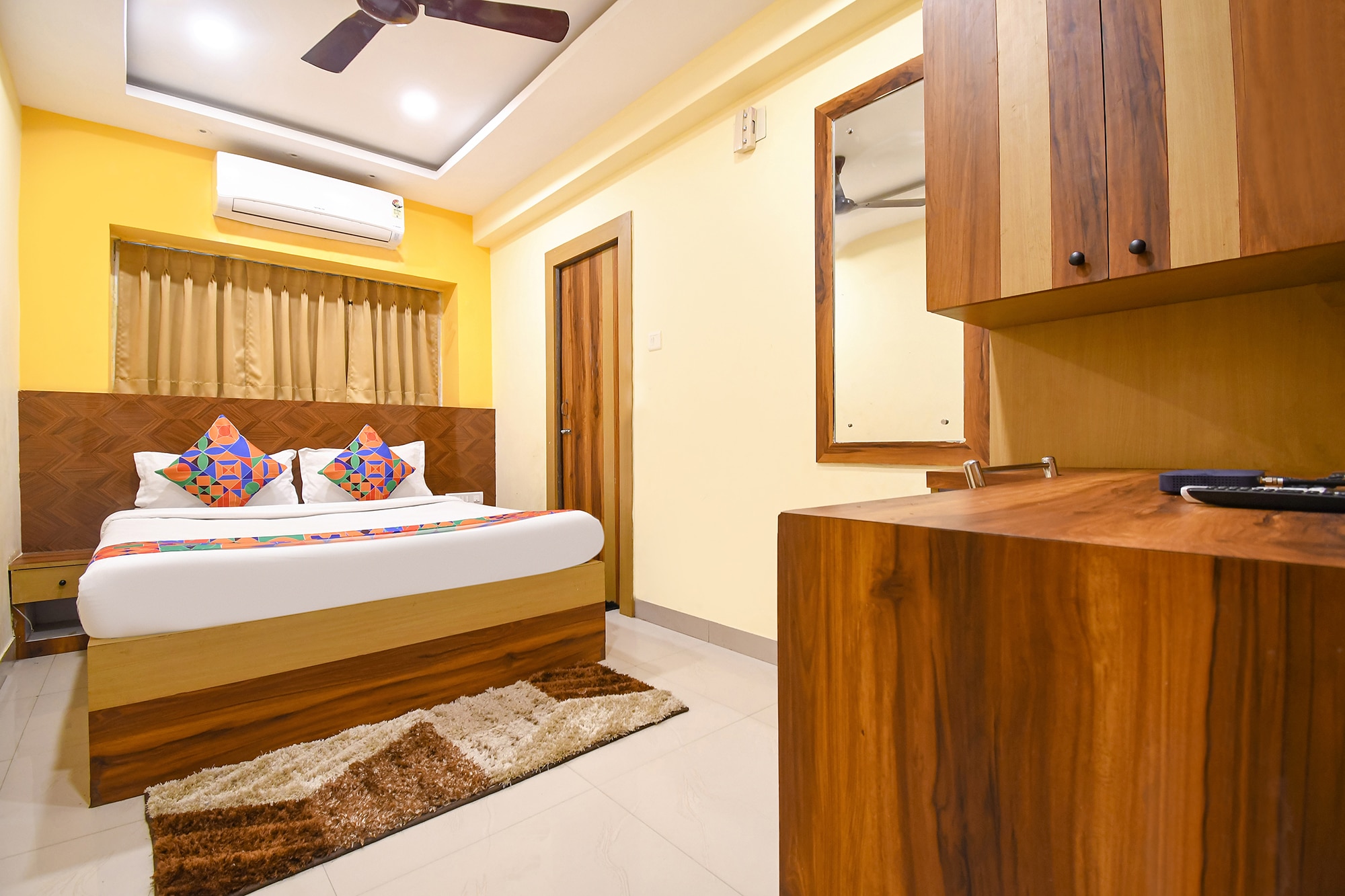 FabHotel Seven Inn 3.0 - Near Care Hospital - Tap to explore photos