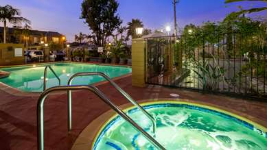 Best Western Palm Garden Inn - Tap to explore photos