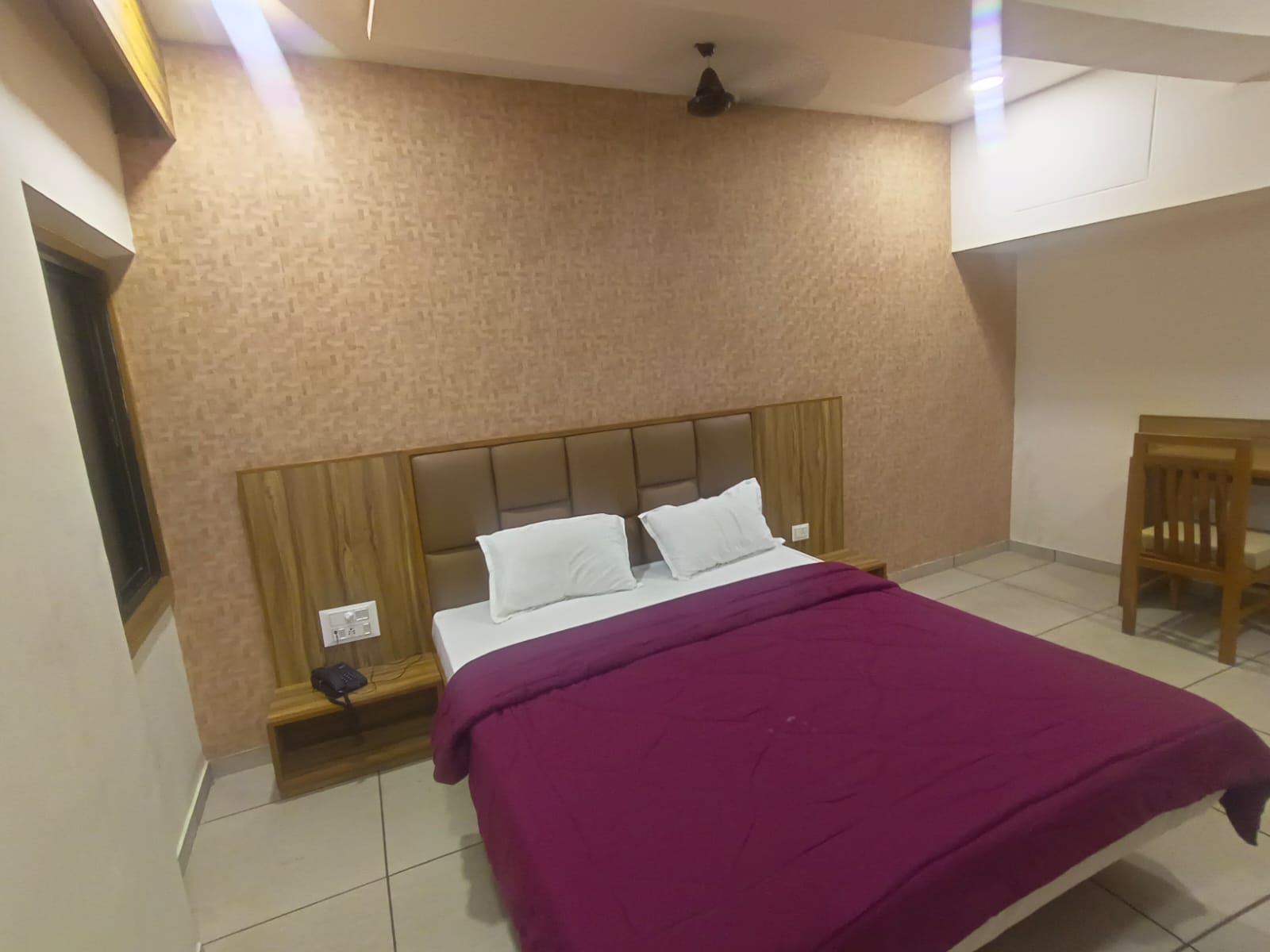 HOTEL MIDTOWN AC AND NON AC ROOMS - Tap to explore photos