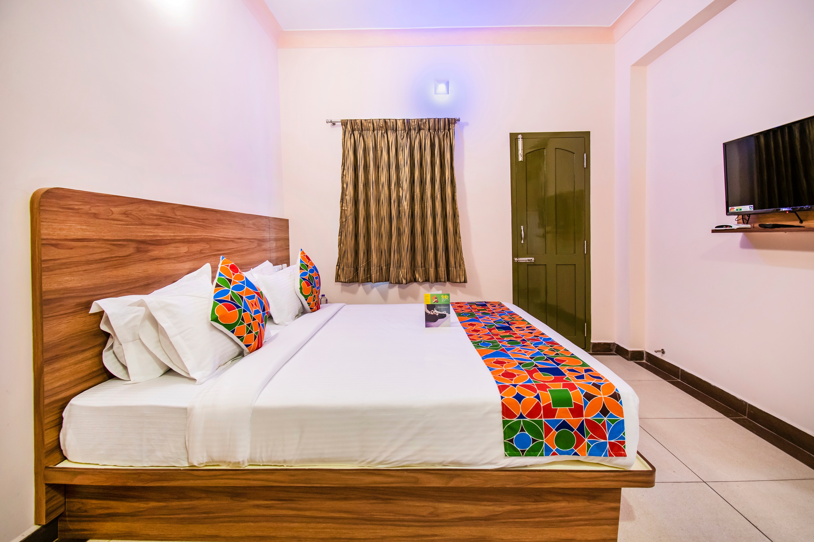 FabHotel Radha Residency - Tap to explore photos