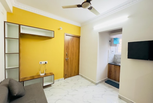 Compact Sarjapur Apartment by ANI living Spaces