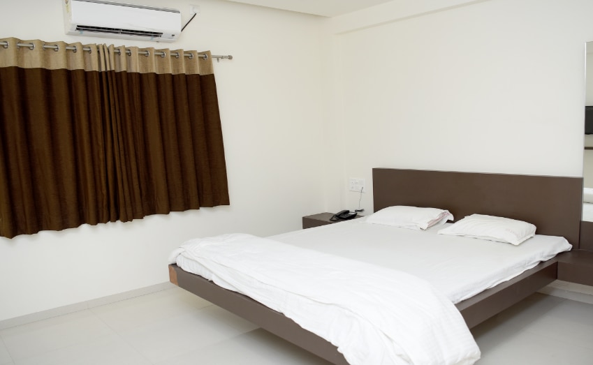 Hotel Vinayak Executive - Tap to explore photos