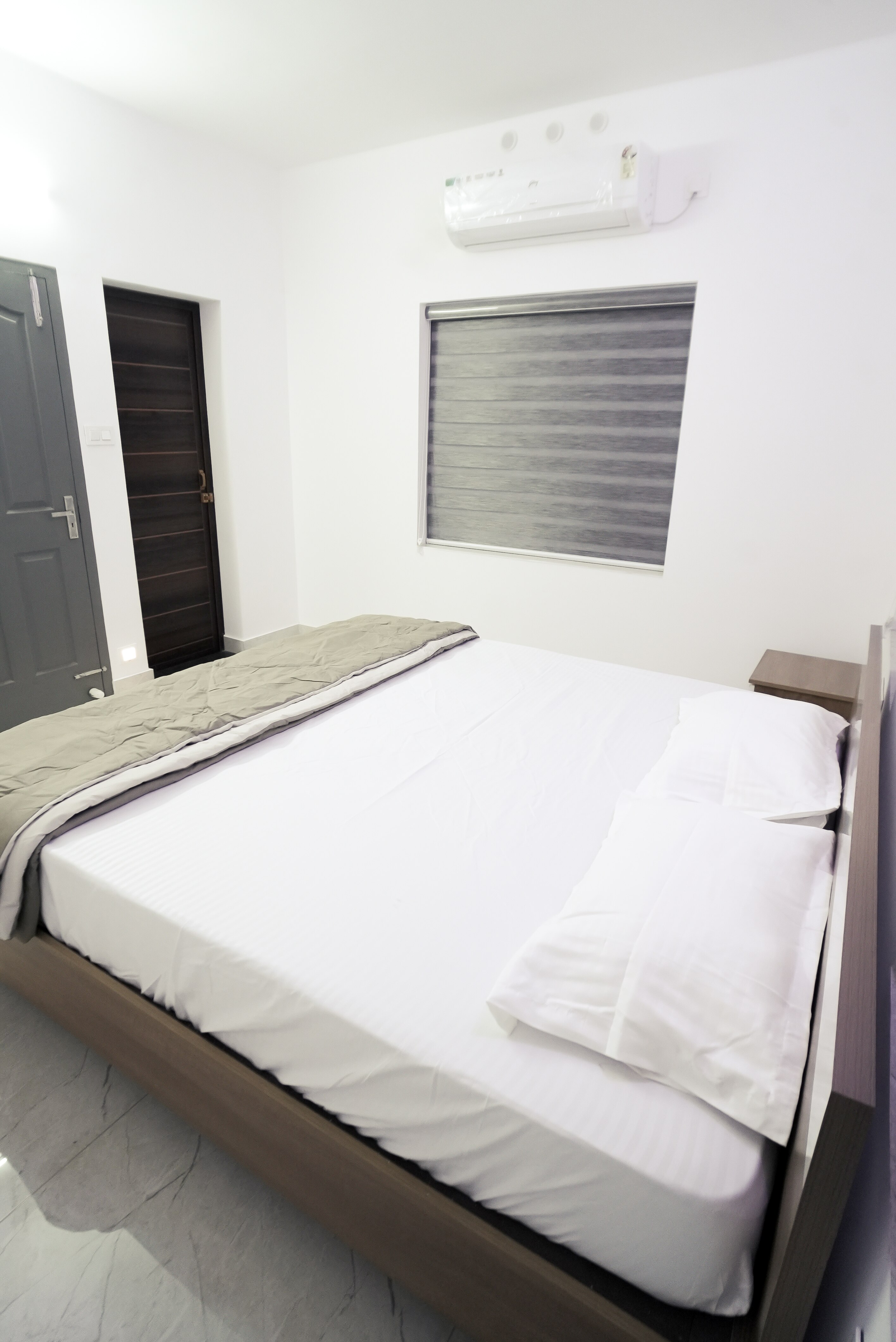 Filza Residency | Room in an Apartment - Tap to explore photos