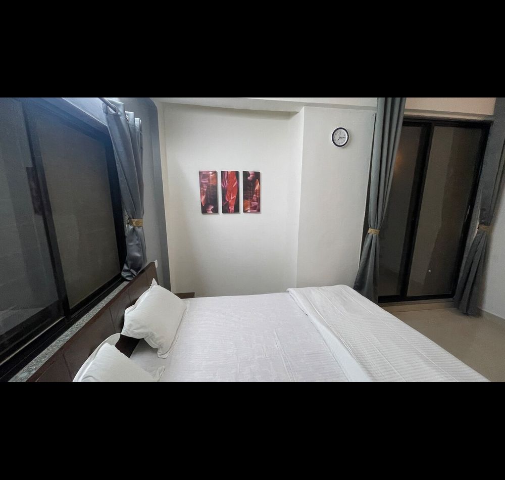 Belle-Vue Holiday Homes Room 21 - Tap to explore photos