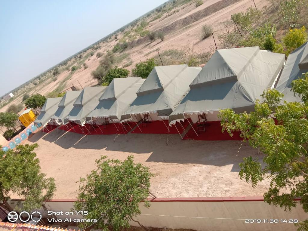 Divine Kumbh Camp - Tap to explore photos