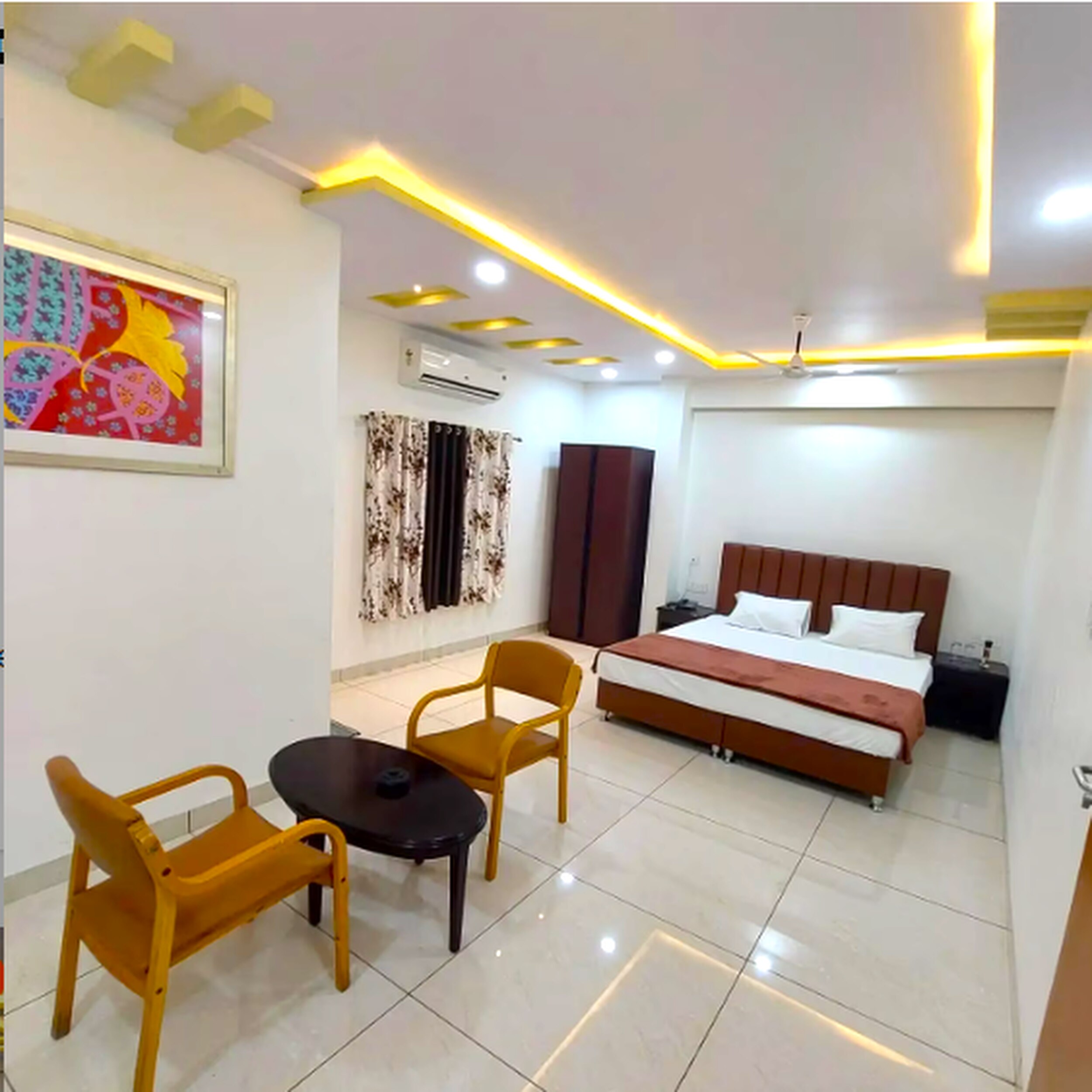 Hotel Dhruva Deluxe Rooms - Tap to explore photos
