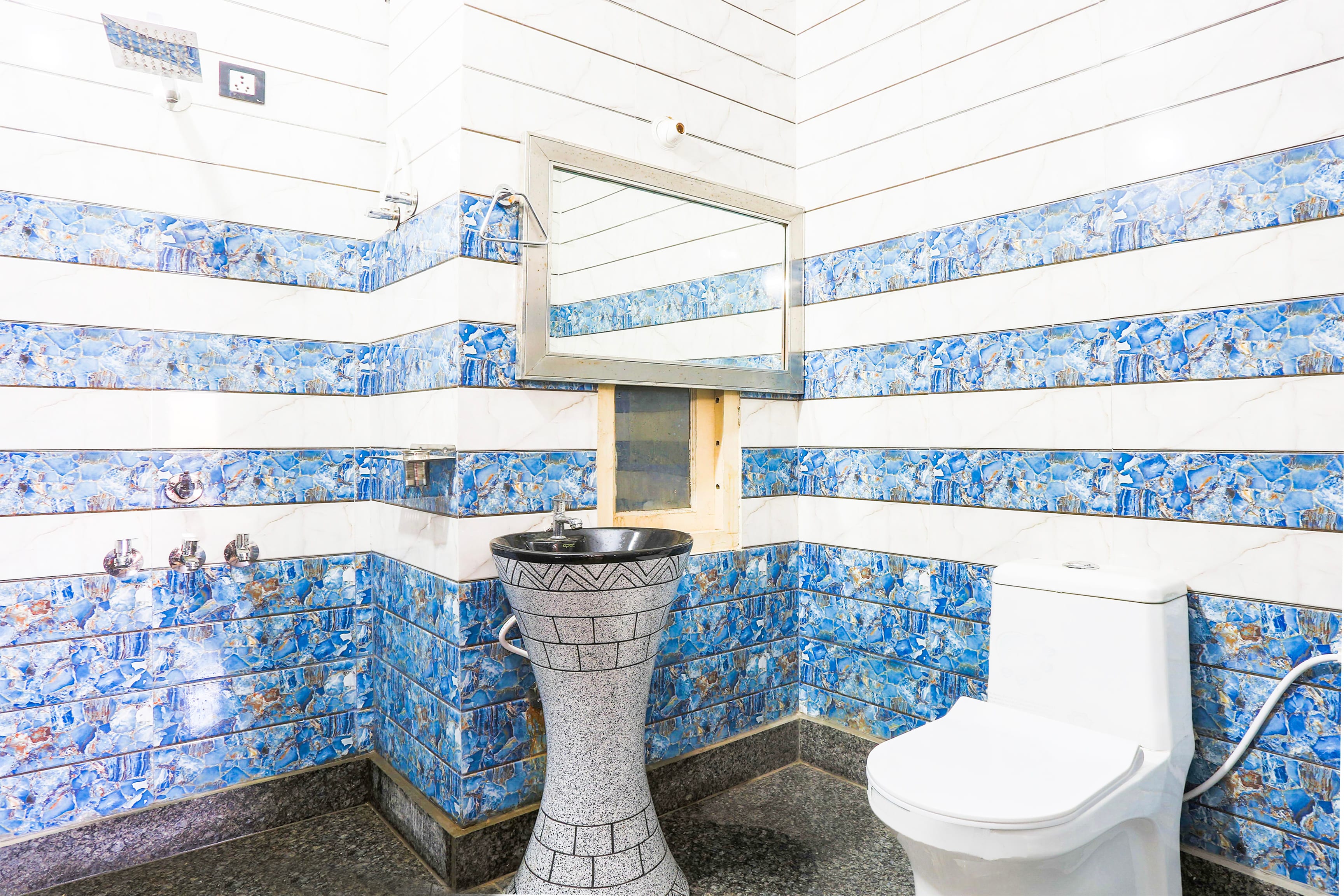 SPOT ON Town City Guest House - Tap to explore photos