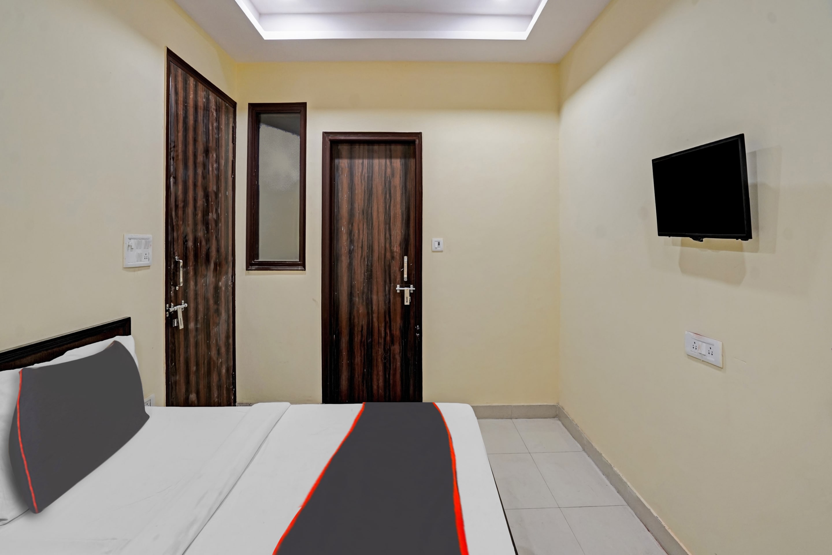 Capital O Mt Corporate Stays Near Iskcon Temple Noida - Tap to explore photos