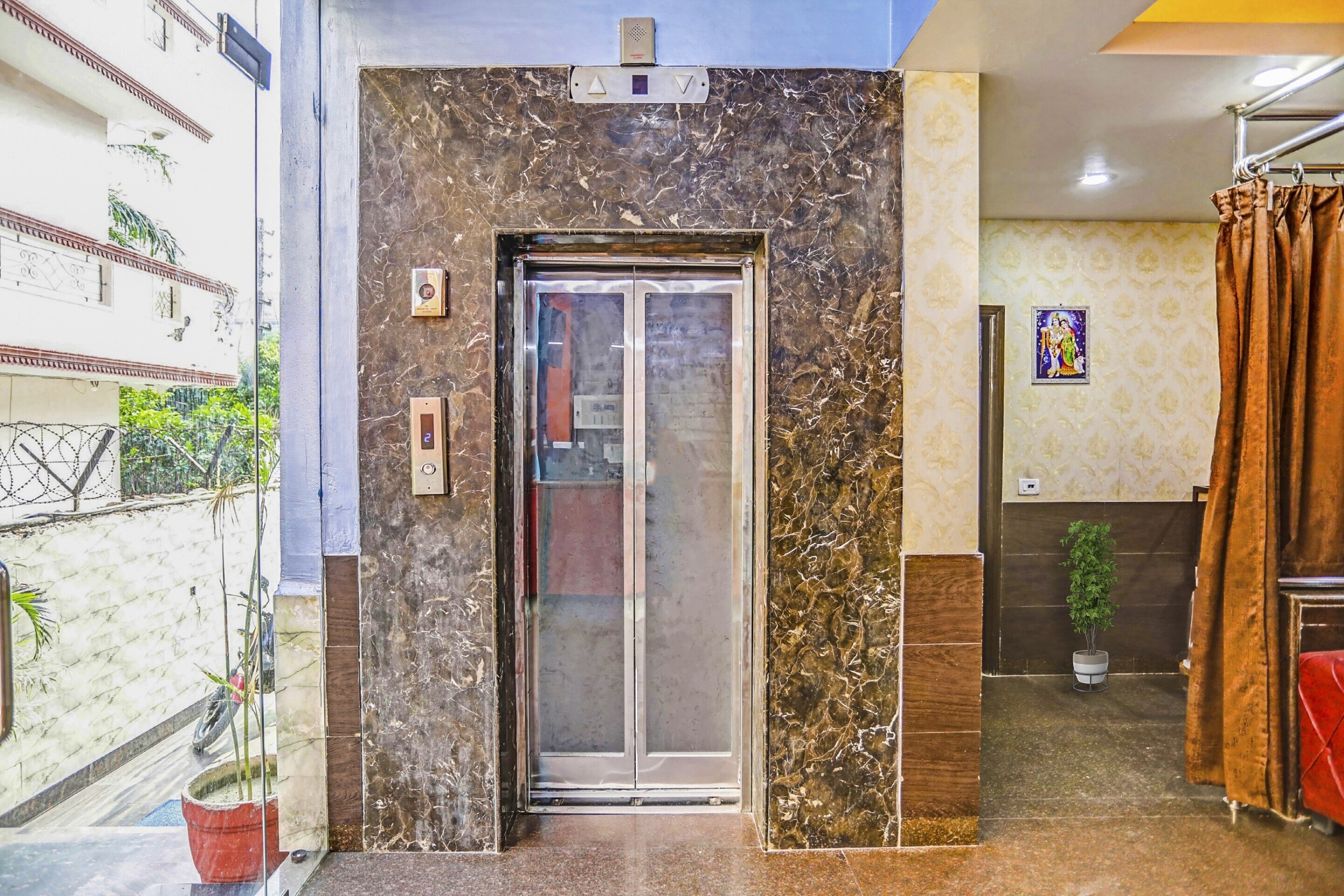 Hotel O U Rooms Near Iskcon Temple Noida - Tap to explore photos