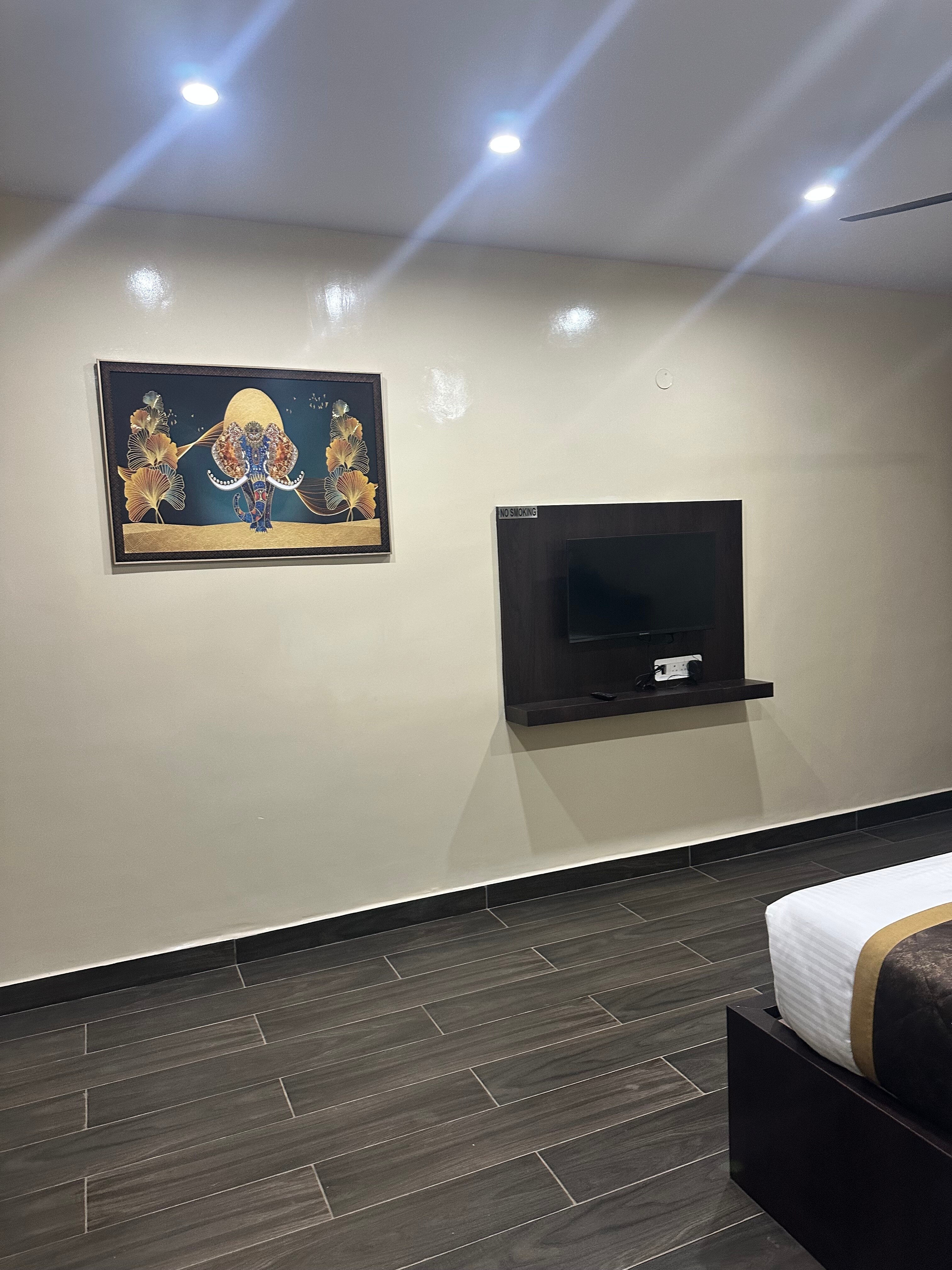 Sannidhi Hotel & Suites - Tap to explore photos