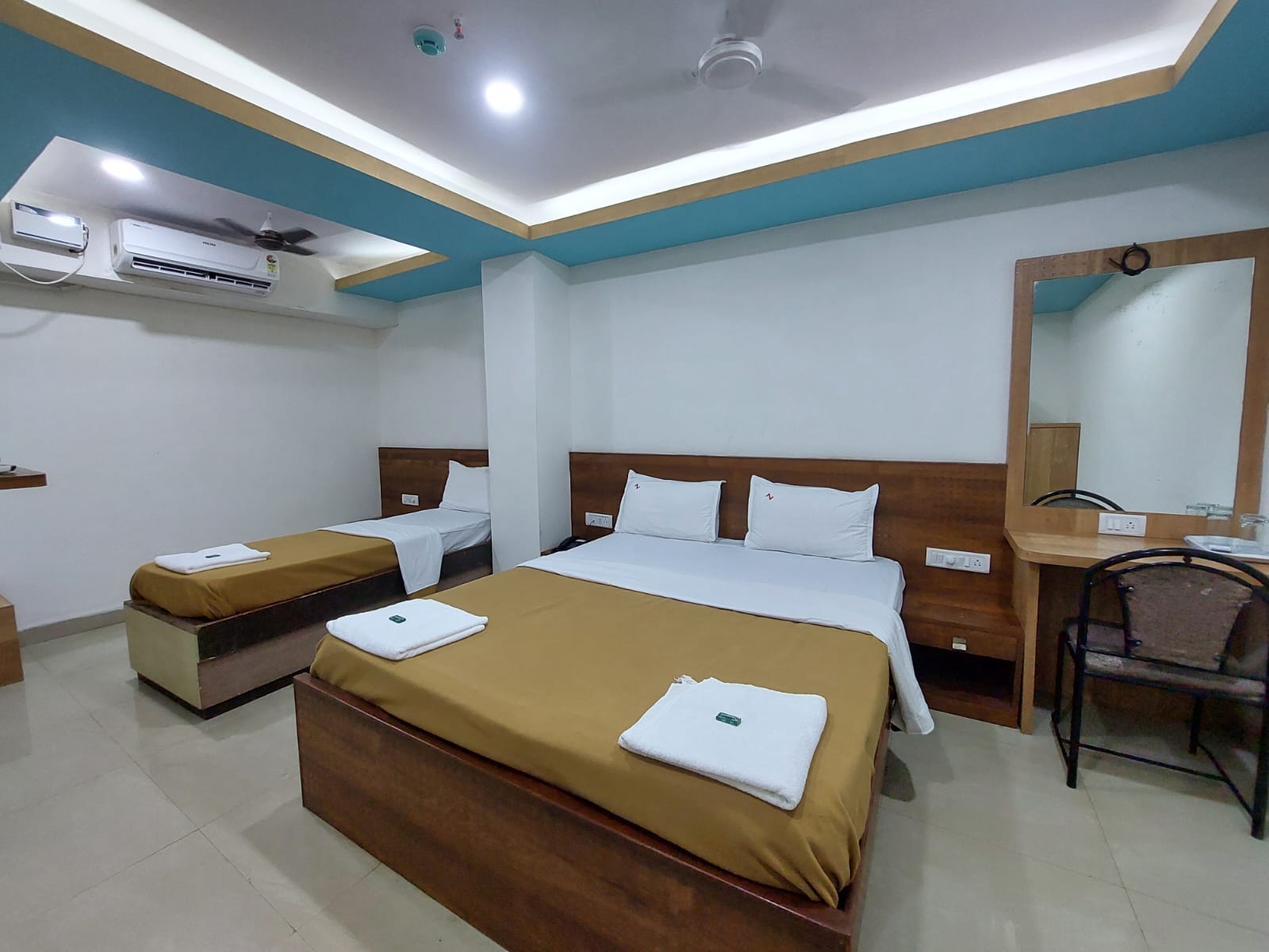 Hotel Z Square, Bicholim - Tap to explore photos