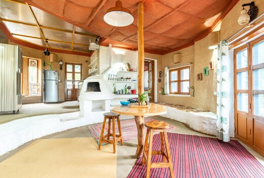 Muddytales   Unique village Cob house