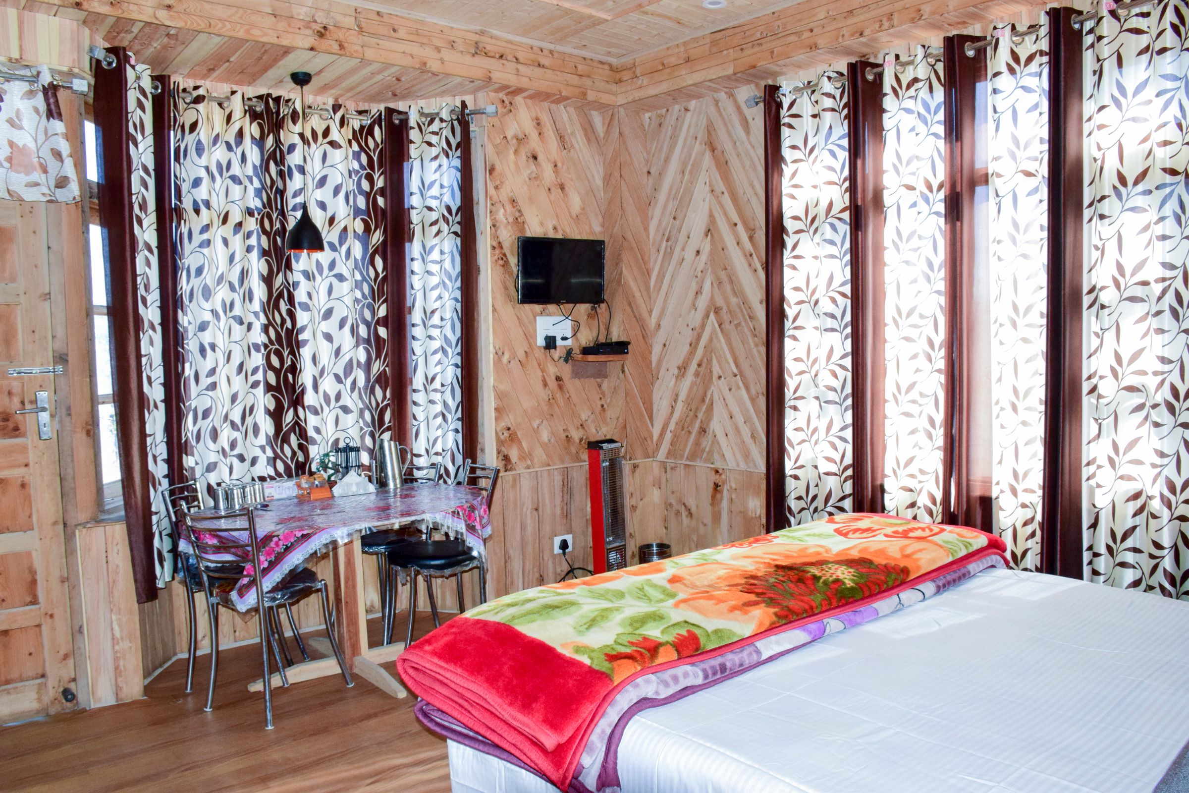 Madhusudan Homestay | Rooms & Kitchen - Tap to explore photos