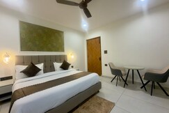 Modern room with ensuite bathroom and balcony, Mukteshwar