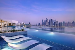 ELIVAAS Curated 1BR Sea & Skyline Views in Seven Palm, Dubai