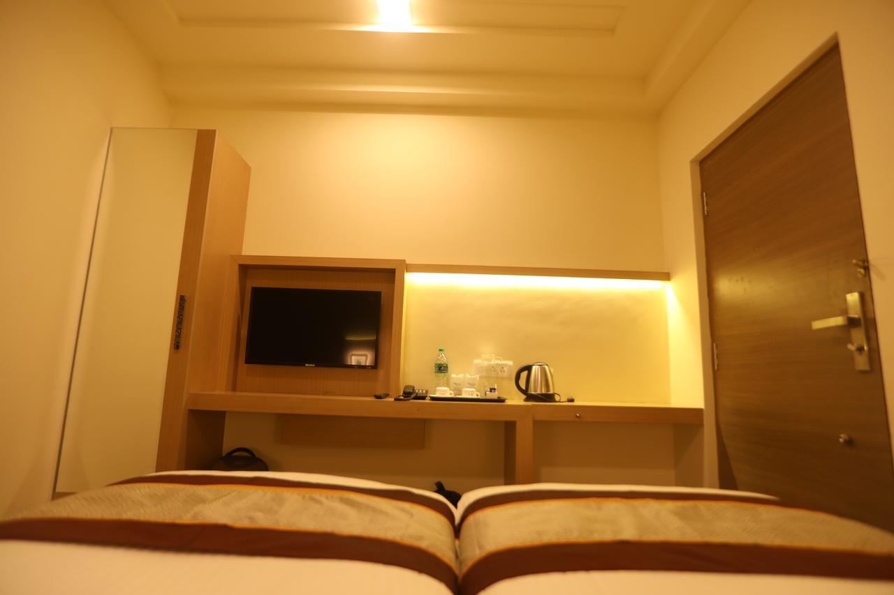 NESTLAY ROOMS VANAGARAM - Tap to explore photos