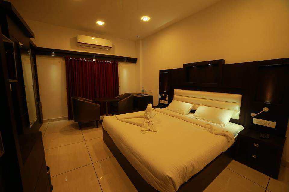 Hotel Theertha International - Tap to explore photos
