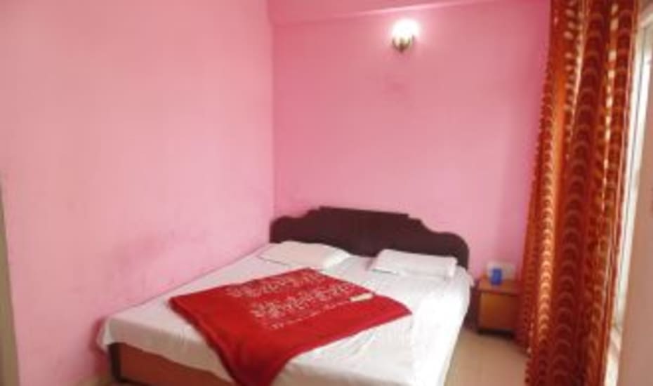 Aradhana Guest House - Tap to explore photos