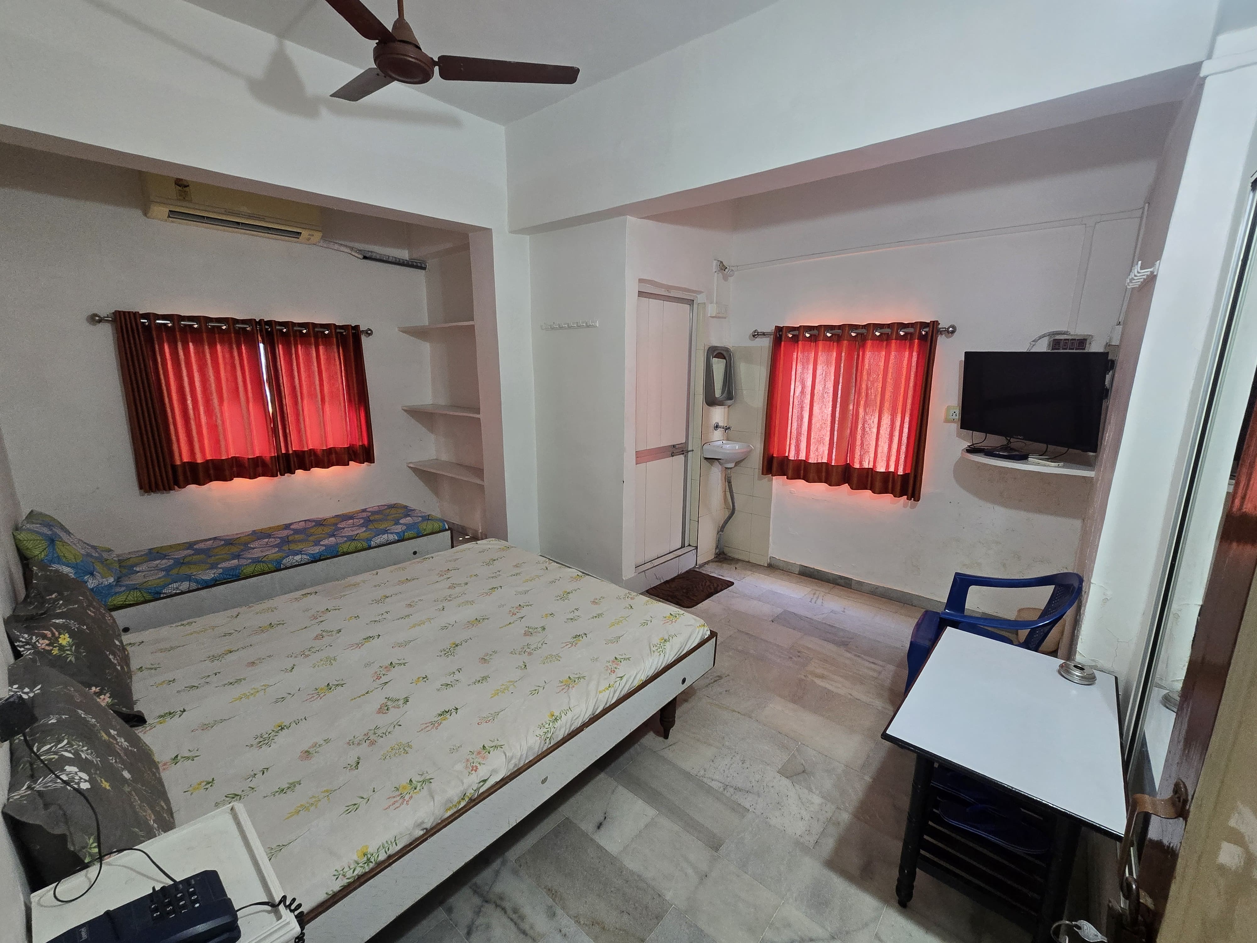 Tulsi Guest House - Tap to explore photos