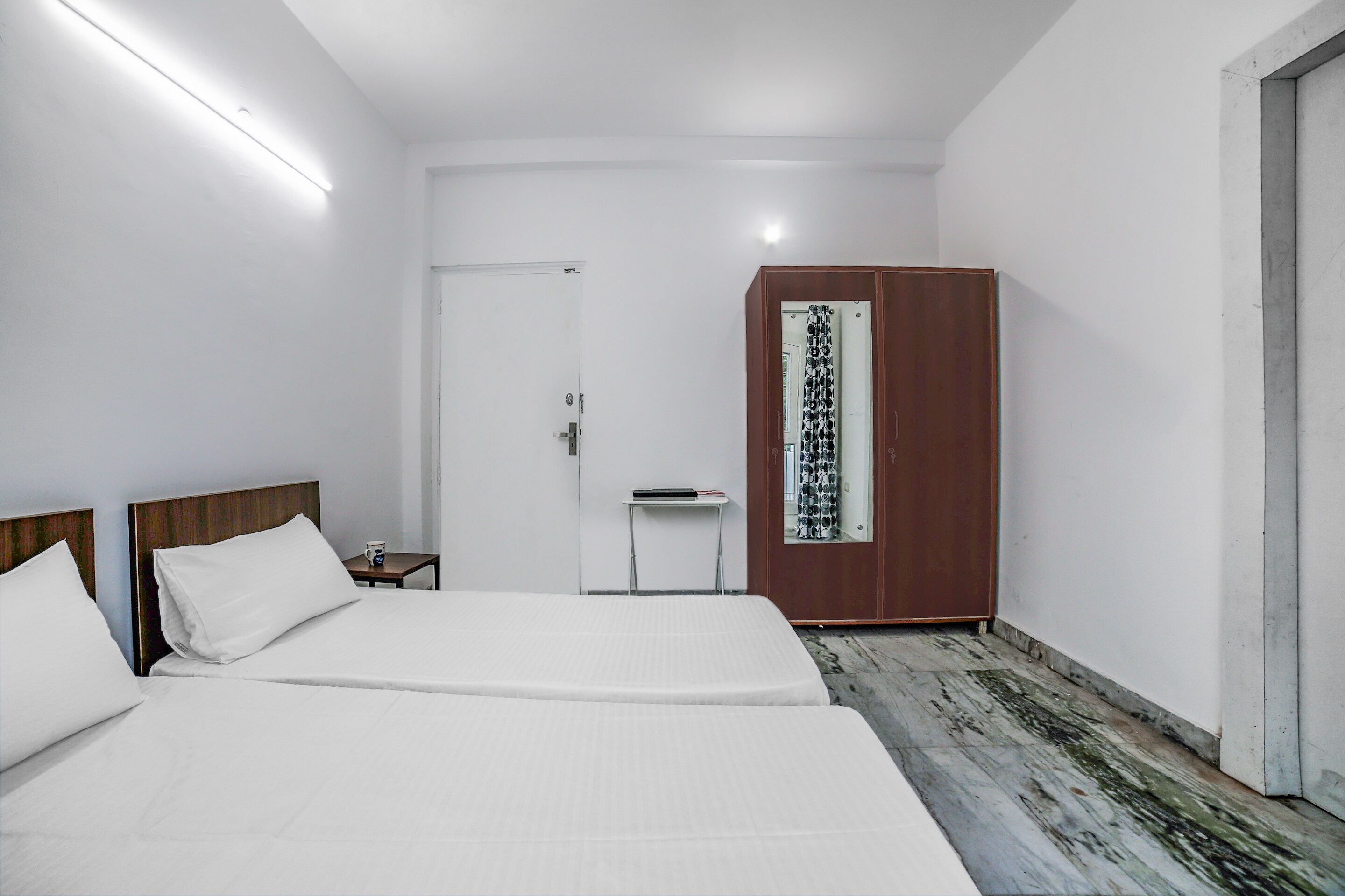 Collection O Shejal Residency - Tap to explore photos