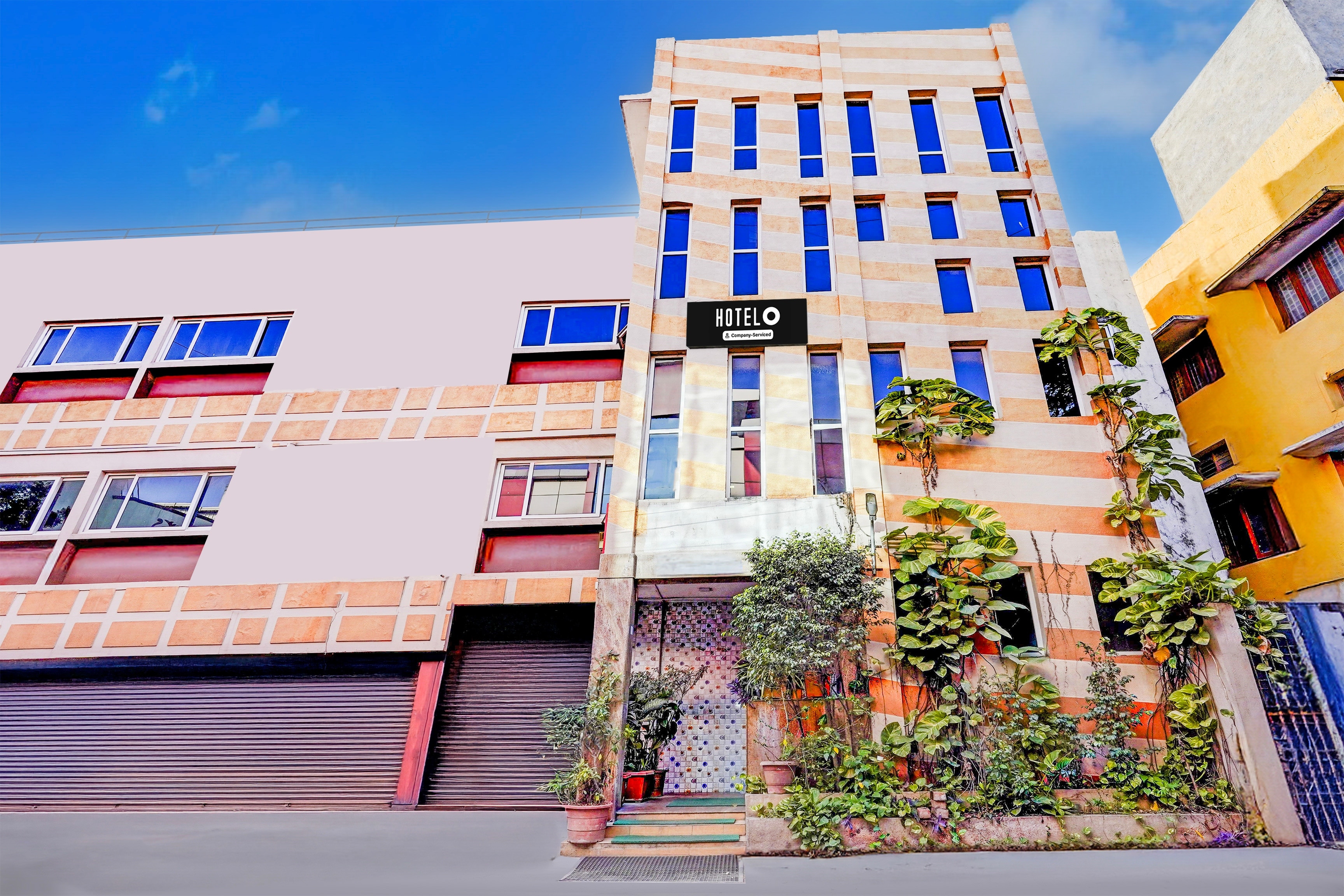 Super Hotel O Arcot Road Porur - Tap to explore photos