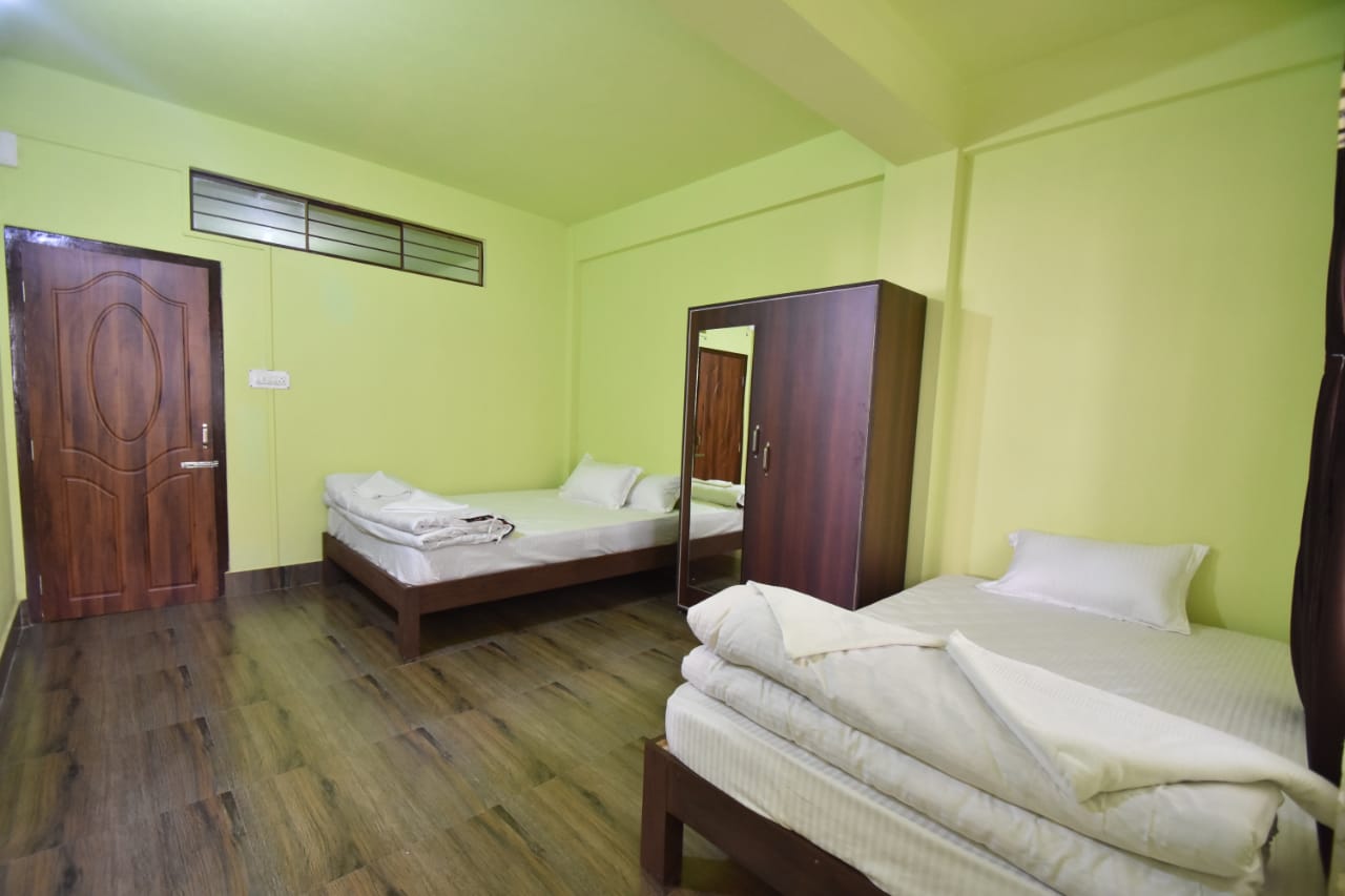 Krisen Guest House - Tap to explore photos