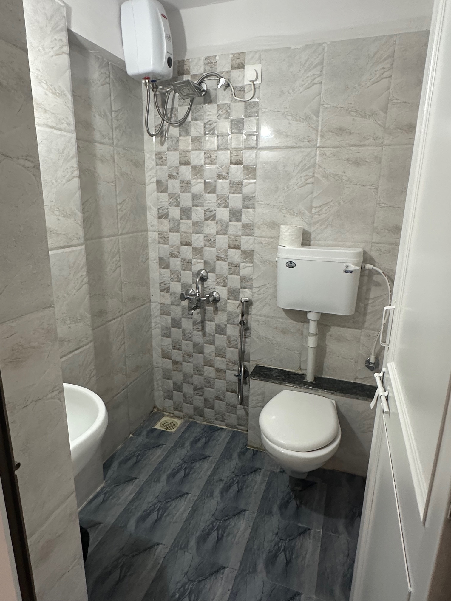 Sunflower Pvt Studio Room in Koregaon Park | AC Wifi Smart TV - Tap to explore photos