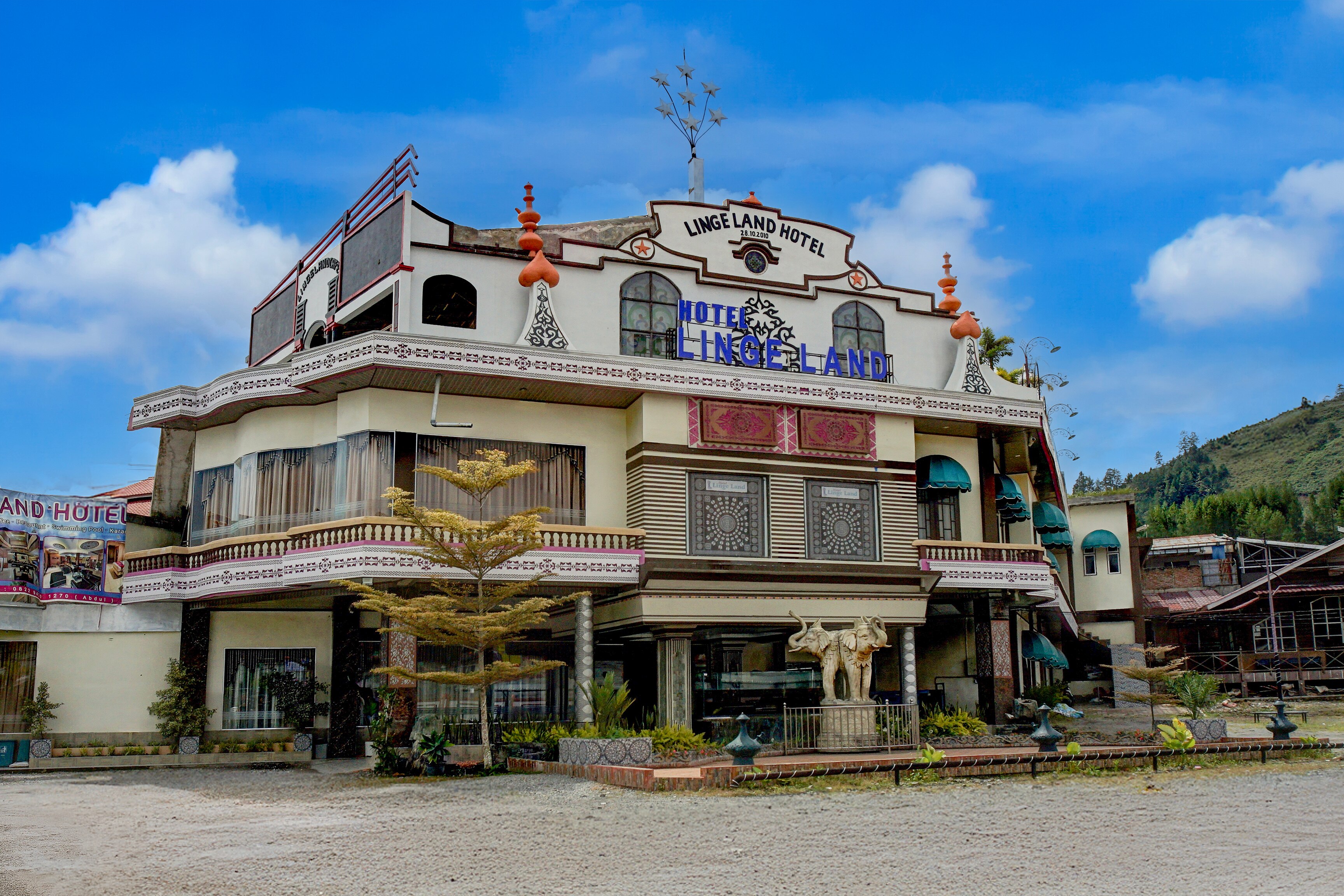 Capital O 93263 Linge Land Hotel - Tap to explore photos