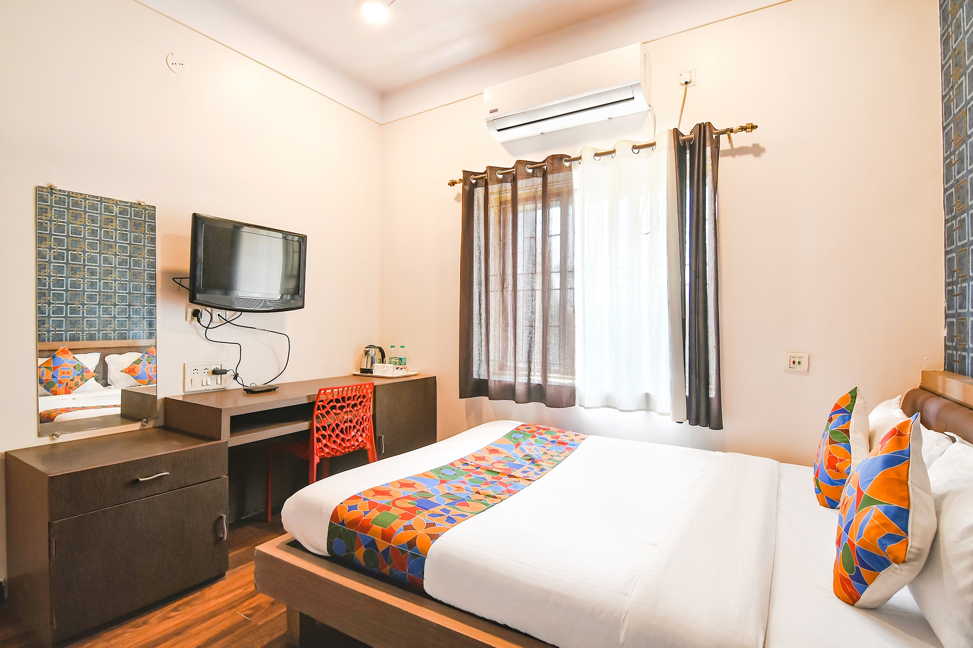 FabHotel S Residency - Nr. TCS, Sector V - Tap to explore photos