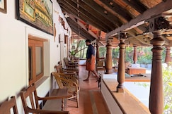 Bhoomi | 2BR Homestay in Alappura | by Homeyhuts, Chittur