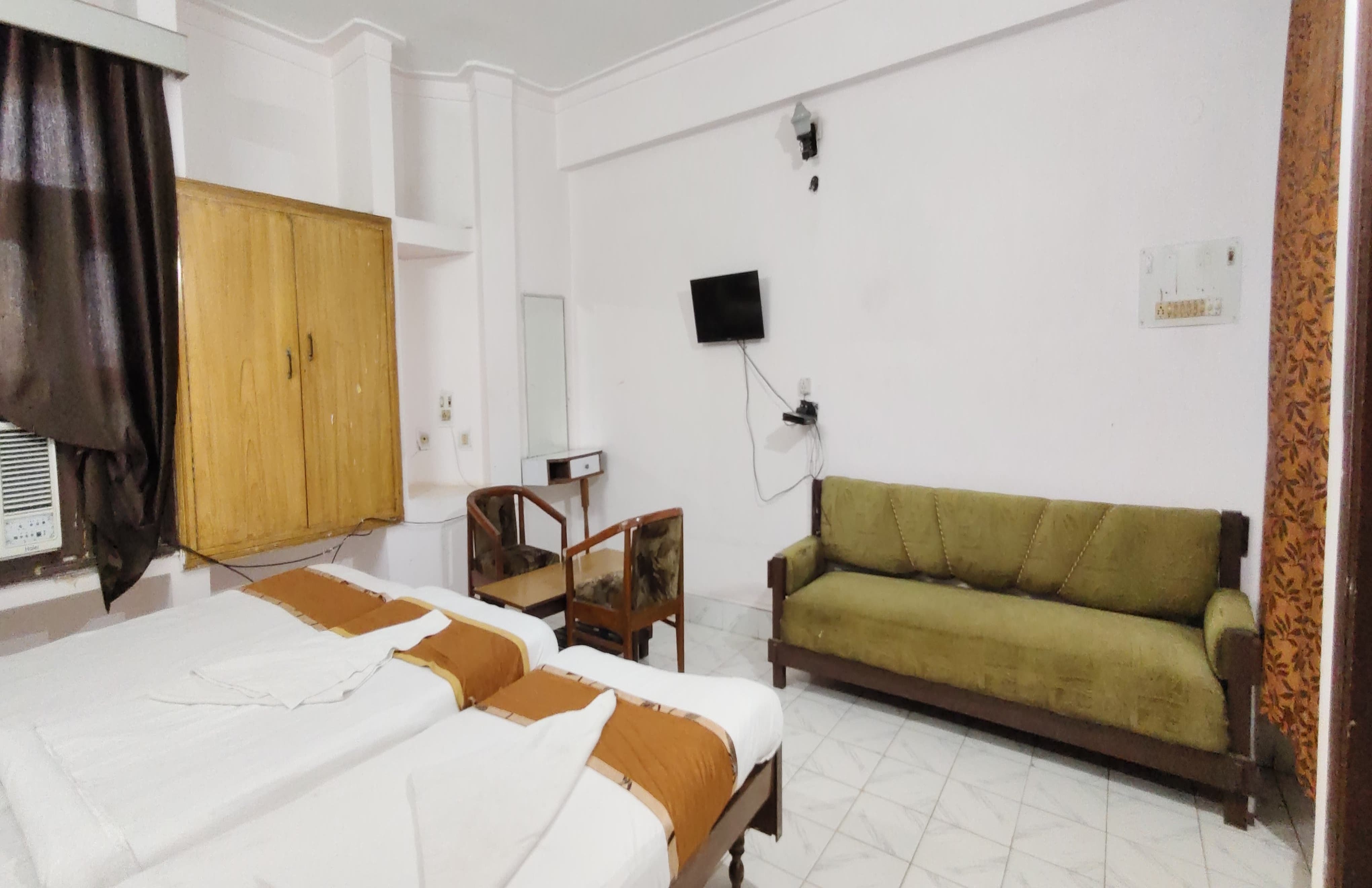 Uruvela International Hotel - Tap to explore photos